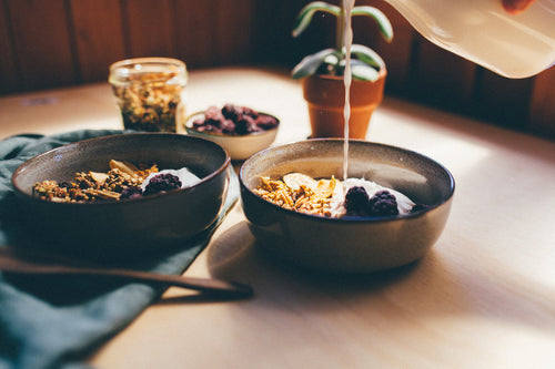 Make it Raw Spiced Apple and Buckwheat Grawnola served with coconut yoghurt and berries. Gluten, dairy and refined sugar free cereal.